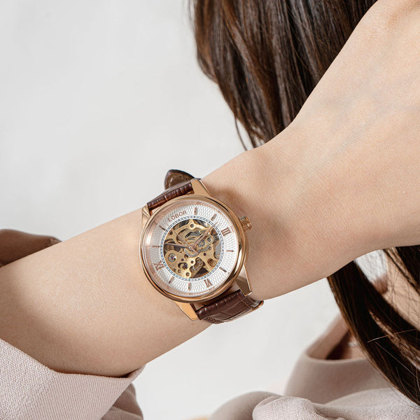 Brown skeleton watch for women