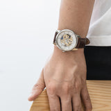 Brown skeleton watch for men