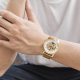 Gold skeleton watch for men