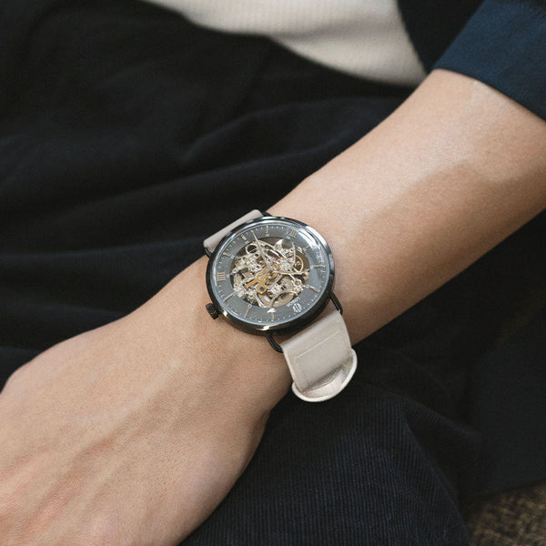 White skeleton watch